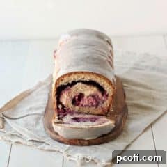 Whole Wheat Blackberry Cream Cheese Swirl Bread with Vanilla Bean Glaze | Baking a Moment