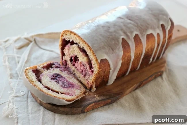 Drizzling Vanilla Bean Glaze on Swirl Bread