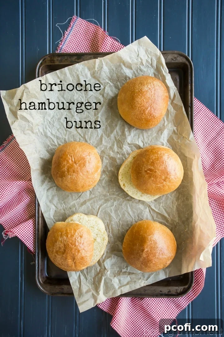 Close-up of perfectly baked, fluffy brioche hamburger buns on a cooling rack