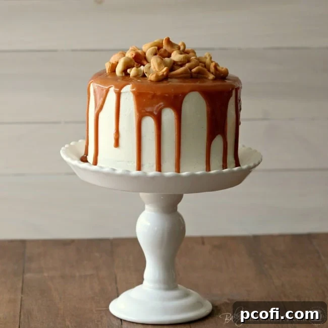 Stunning Vanilla Malt Layer Cake with Salted Caramel Drip and Roasted Cashews