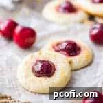 Cherry Cheesecake Thumbprint Cookies: the cream cheese cookie was SO good with the glazed cherry! Loved the little sprinkling of crunchy graham cracker crumbs too. This recipe is definitely a keeper! food desserts cookies