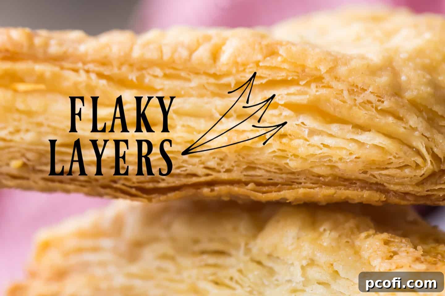Close-up side view of puff pastry, revealing numerous delicate, flaky layers, demonstrating a desired pie crust texture.