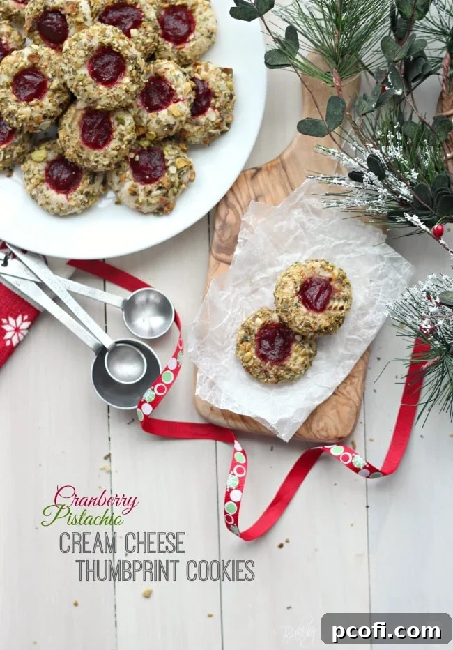 Cranberry Pistachio Cream Cheese Thumbprint Cookies | Baking a Moment