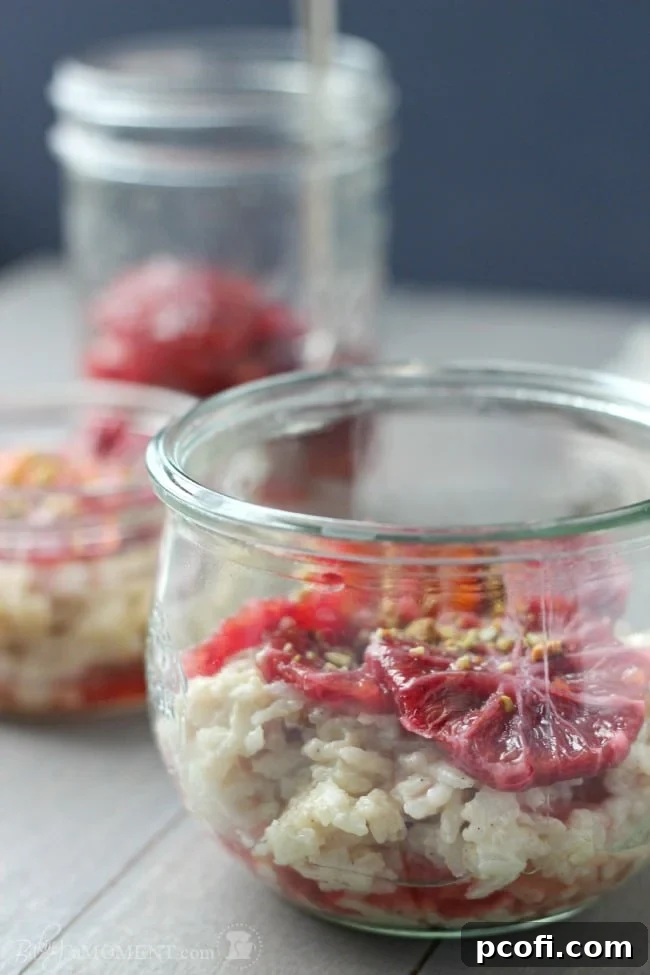 Cooked rice spread out on a plate to cool and dry, a preparatory step for making creamy rice pudding.