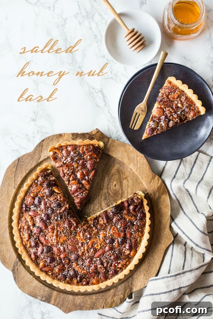 Honey Nut Tart: The sweet, nutty smell of this gooey tart filled my house as it was baking. It was like a warm hug! #honey #nut #tart #fall #dessert