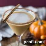 A festive Pumpkin Spice Latte Martini, a boozy adult beverage perfect for Thanksgiving.