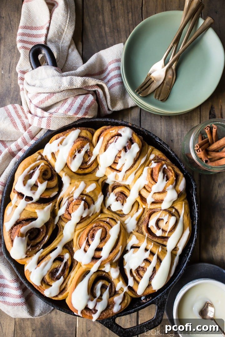 Gingerbread Cinnamon Rolls: so soft and gooey! Loved the added warmth of ginger and molasses, and the lemon-y cream cheese icing was so good! #food #cinnamonrolls #baking #brunch #breakfast #christmas #holiday #cinnabon
