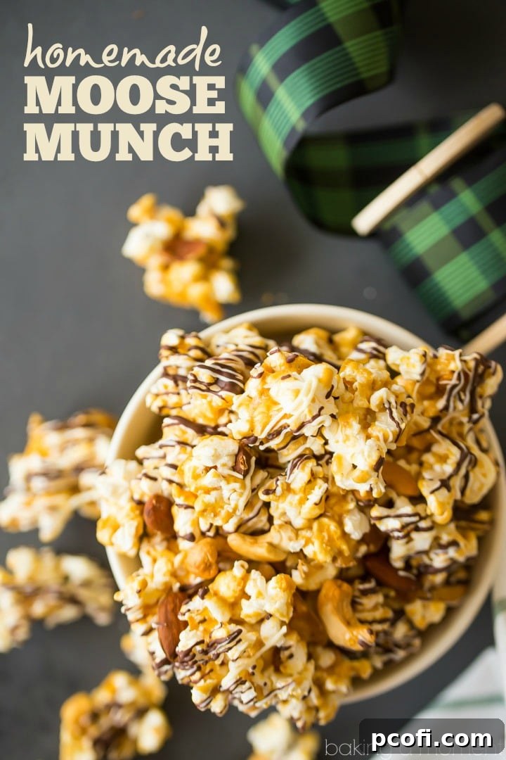 Homemade Moose Munch: Light, crisp butter toffee caramel popcorn with almonds and cashews, drizzled with white and dark chocolate. Makes a great holiday gift! #food #desserts #popcorn #caramel #homemade #holiday #gift #recipe