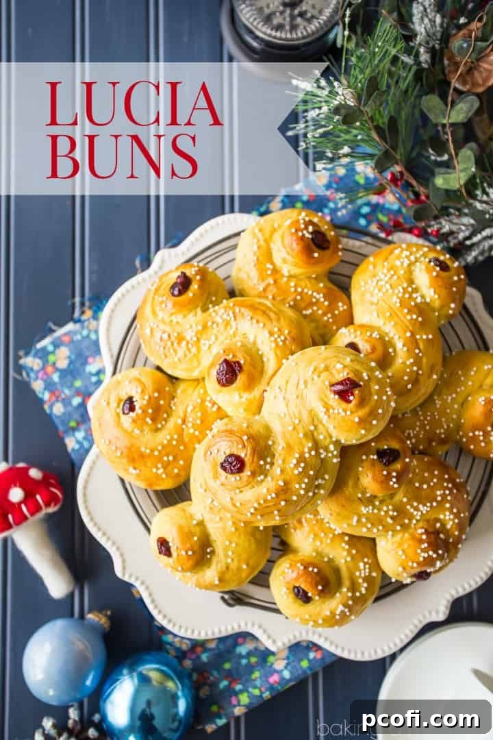 Close-up of saffron-scented Lucia Buns, elegantly shaped into 'S' scrolls, glistening with a dusting of sugar and garnished with dried cranberries. These light, soft pastries are a centuries-old Scandinavian tradition, perfect for enjoying with a warm cup of coffee during the holidays. Keywords: food, bread, desserts, baking, Swedish, luciabuns, stluciaday, holiday, saffron.