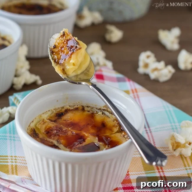 Buttered Popcorn Creme Brulee, featuring a creamy custard with a caramelized sugar top, garnished with popcorn.