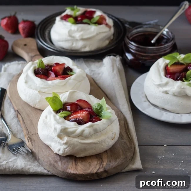 Elegant Strawberry Balsamic Pavlovas with Whipped Cream