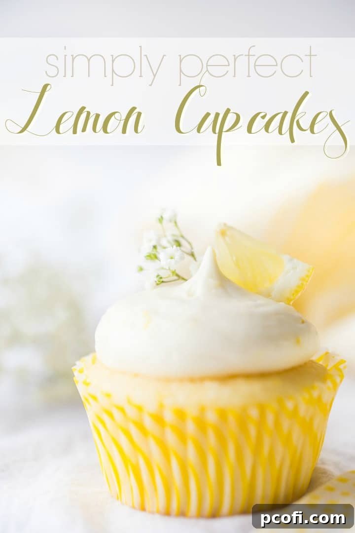 Text overlayed image of a beautifully frosted lemon cupcake with lemon curd filling and lemon cream cheese frosting, garnished elegantly.