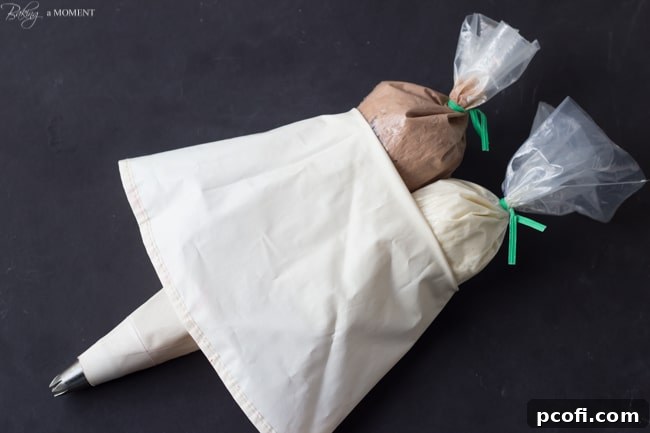 How to Pipe Two Colors of Frosting Swirled Together for Black & White Malt Shoppe Cupcakes