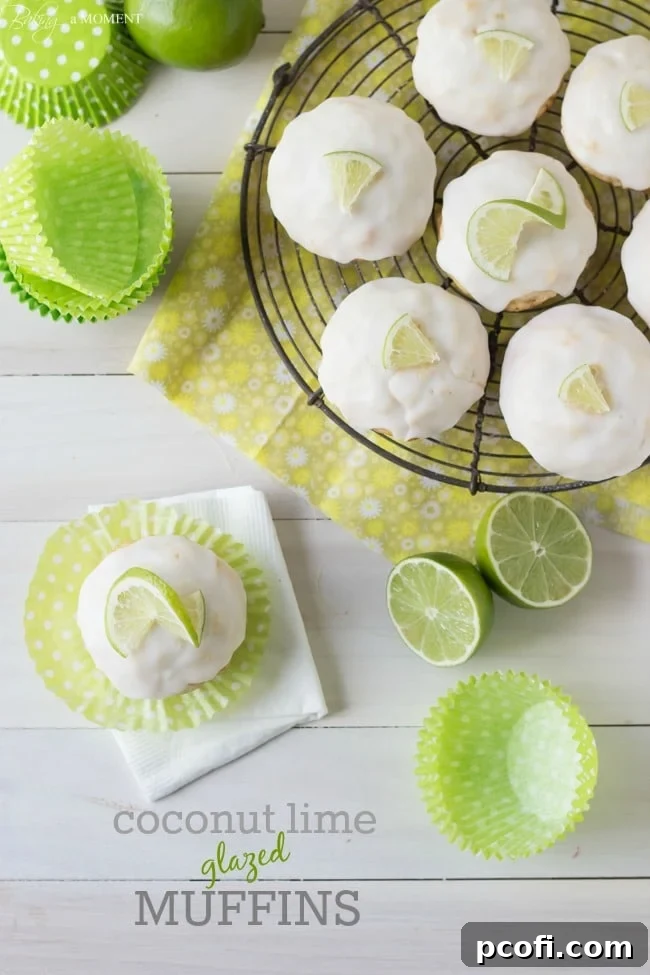 Close-up of freshly baked Coconut Lime Glazed Muffins, showcasing their fluffy texture and golden-brown tops.