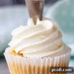 Whipped cream frosting: pipes well and can be made ahead! Perfect for cupcakes and cakes.