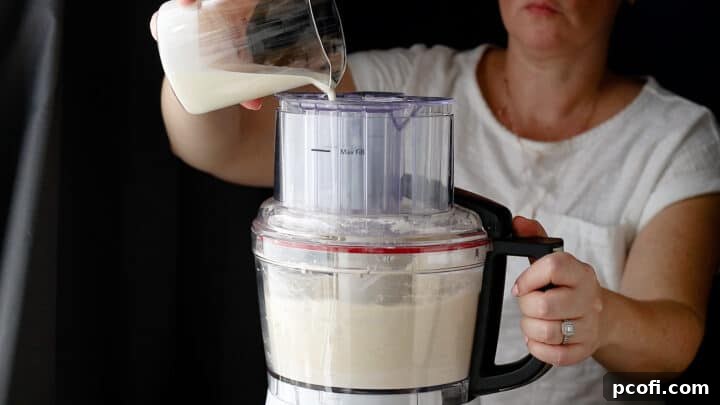 Streaming cold cream into the food processor.