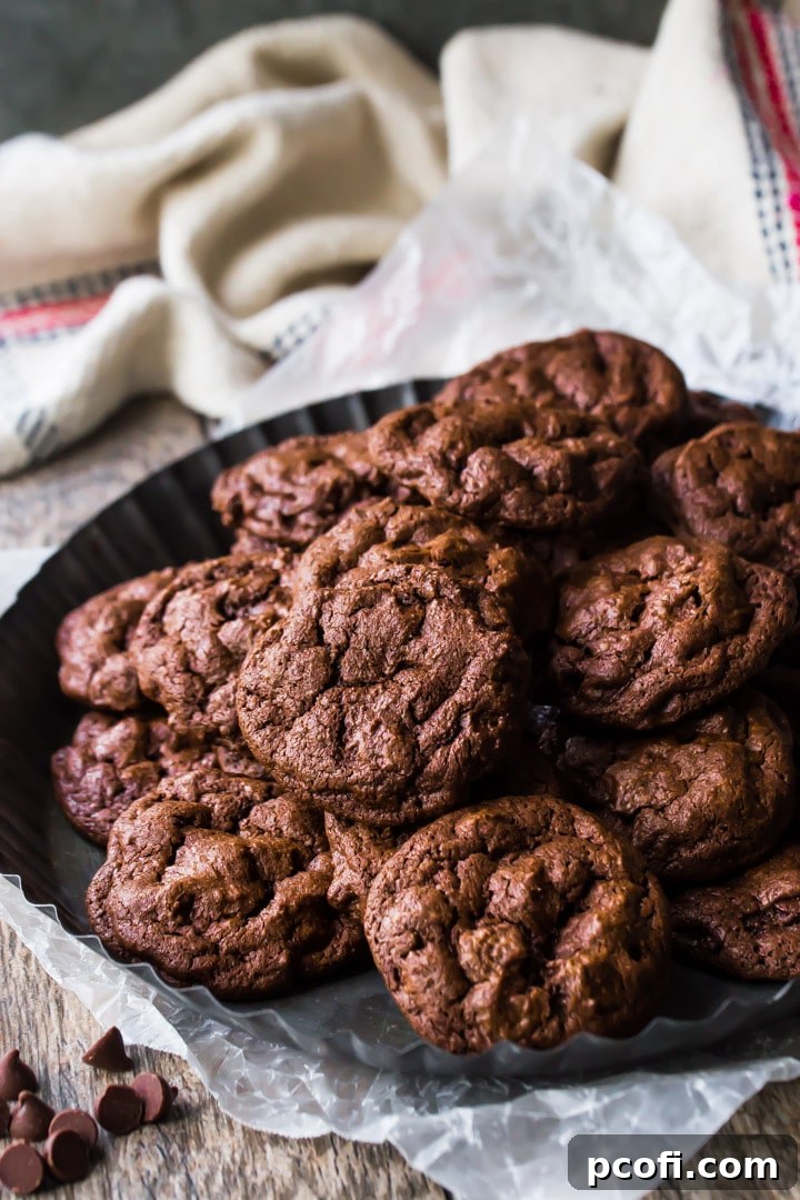 Fudgy brownie cookie recipe with a beautiful crackle top, emphasizing homemade goodness.