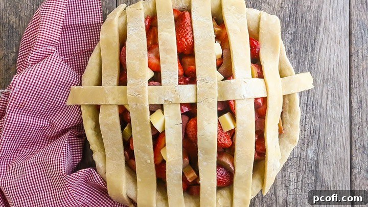 How to Make Lattice Pie Crust Step-by-Step: First woven strip.