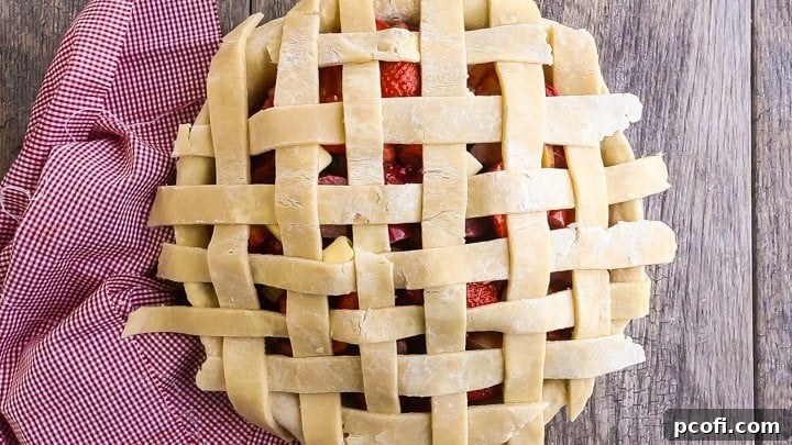 How to Make Lattice Pie Crust Step-by-Step: Woven crust to be trimmed.