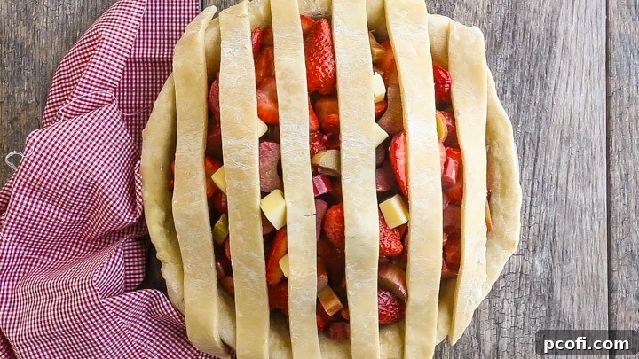 How to Make Lattice Pie Crust Step-by-Step: Laying Vertical Strips.