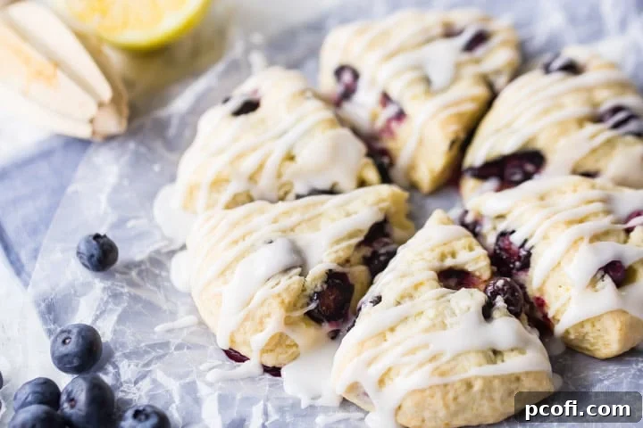 Moist Lemon Blueberry Scone Recipe with a close-up of blueberries