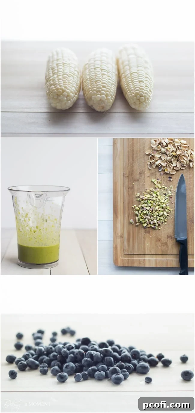 Overhead view of a prepared Corn & Blueberry Flatbread with Basil Vinaigrette & Pistachios.