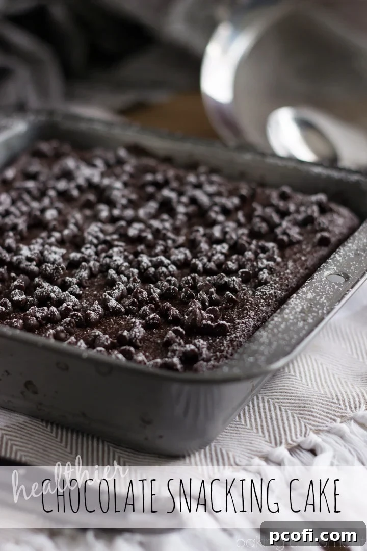 Healthier Chocolate Cake: whole wheat, coconut oil, applesauce, & Greek yogurt. The texture and flavor are amazing!! So chocolate-y & moist, & a snap to make!