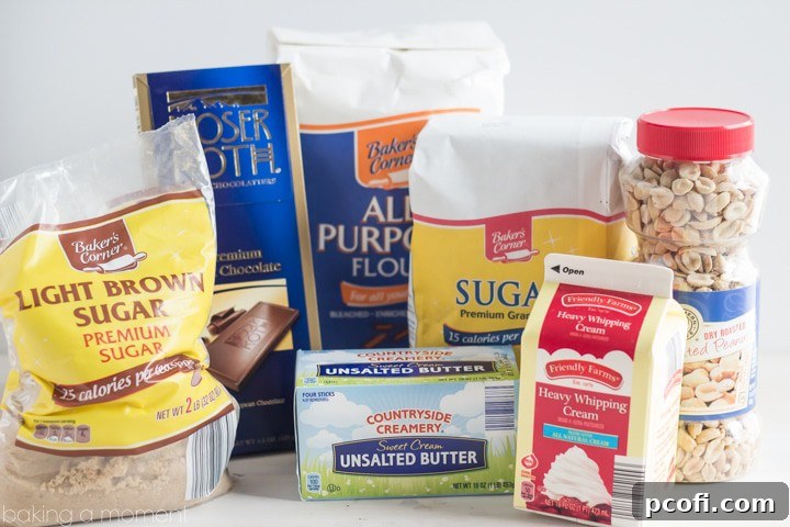 Fresh ingredients for a Snickers Blondie Tart, including peanut butter, chocolate, sugar, flour, butter, and eggs, laid out on a kitchen counter.