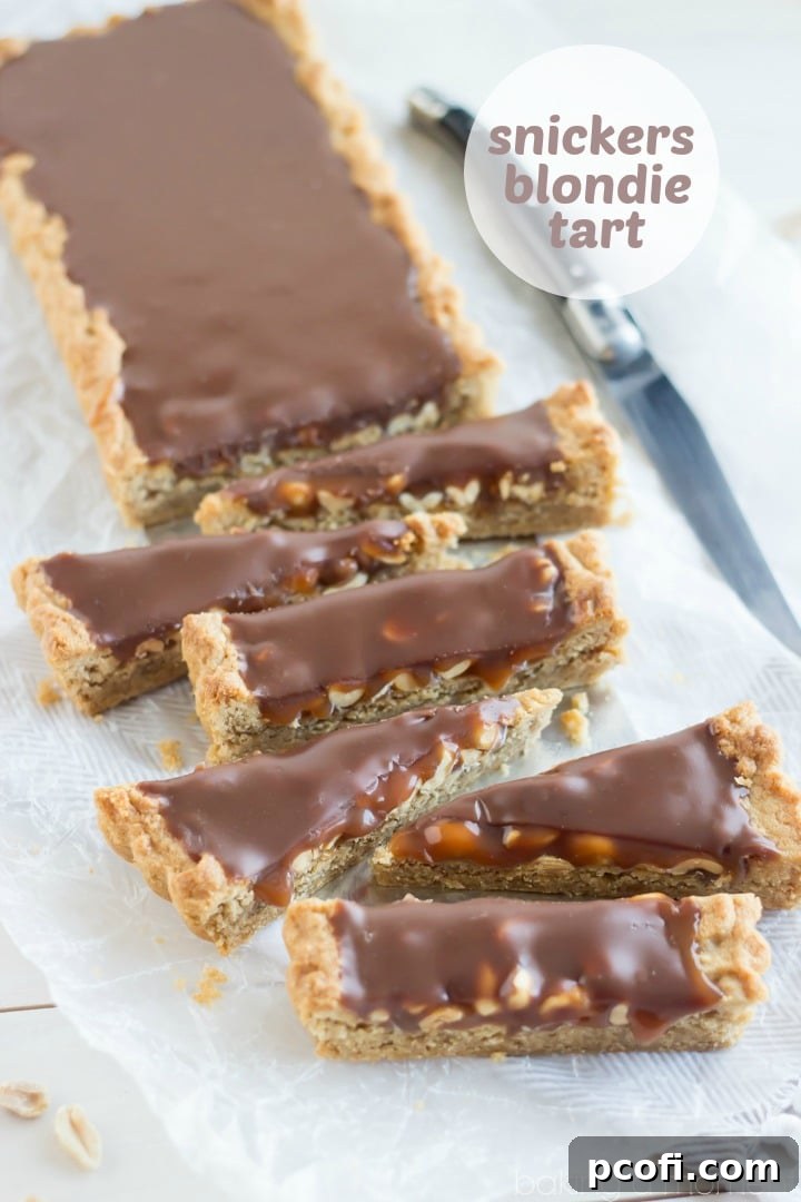A baked peanut butter blondie tart base, perfectly golden and ready for its delicious toppings.