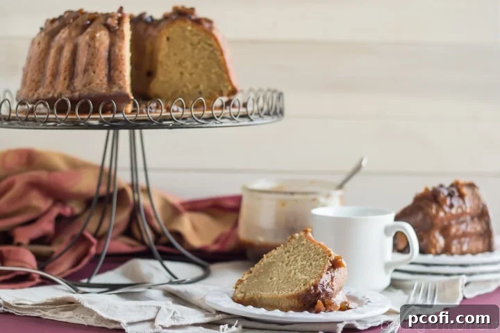 Top-down view of the beautifully baked Chestnut Praline Coffee Bundt Cake, with more chestnut praline sauce on top.