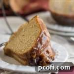 Thumbnail of Chestnut Praline Coffee Bundt Cake, drizzled with sauce.