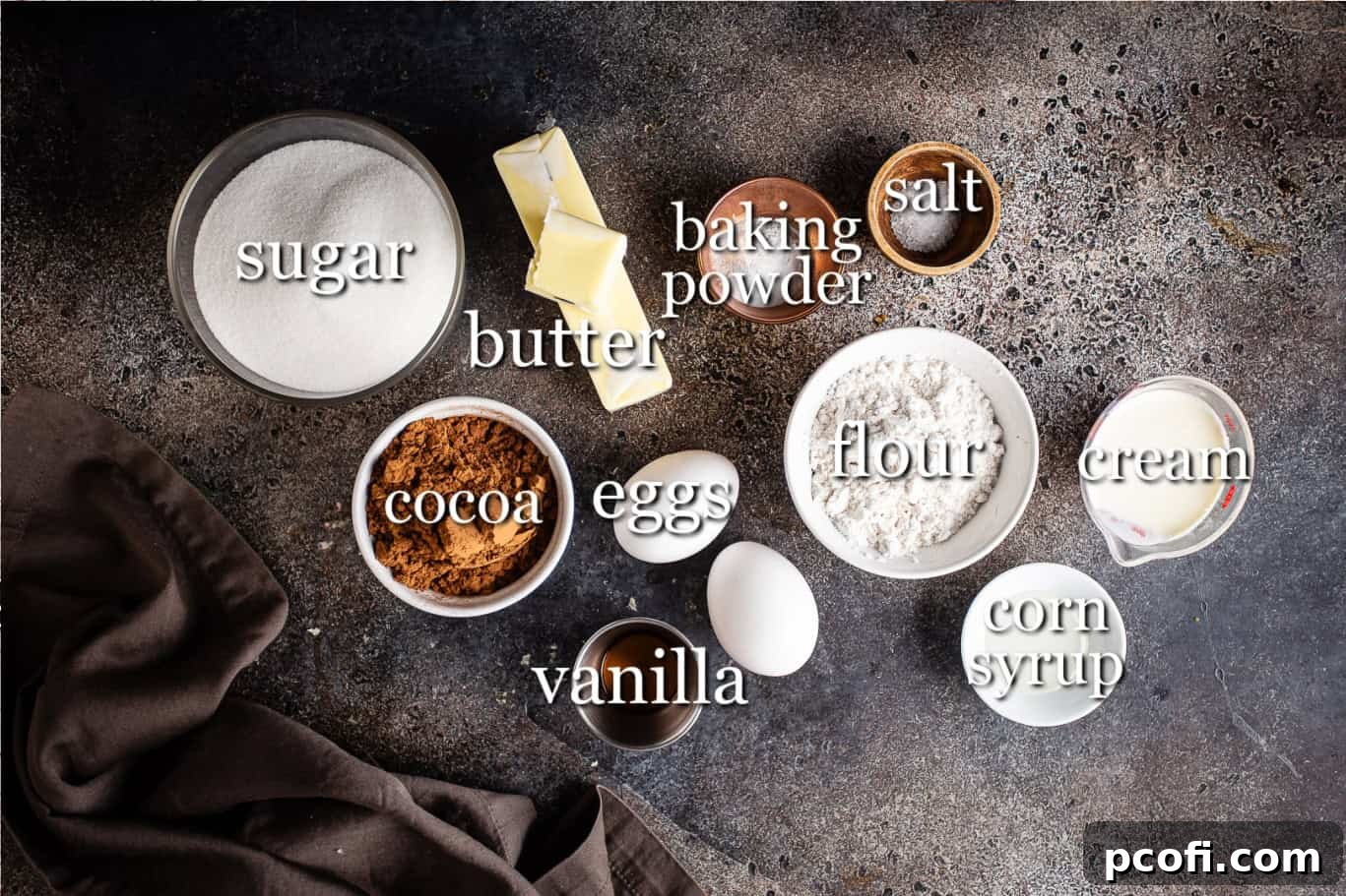 Ingredients for making salted caramel brownies, with text labels for each component.