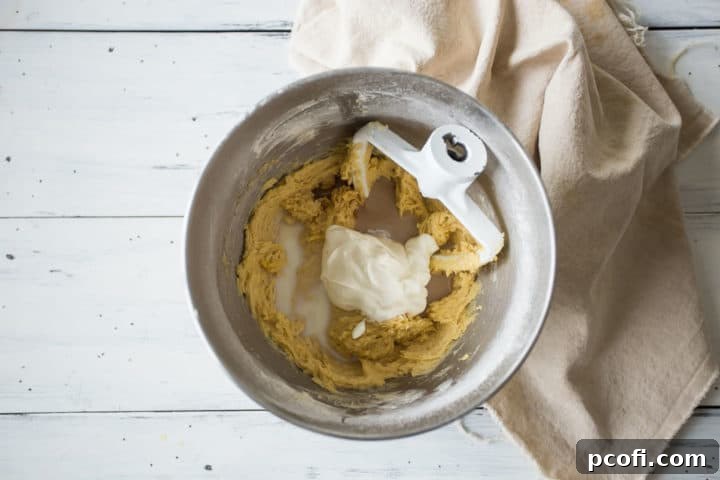 Tres leches cake batter with sour cream, milk, and vanilla.