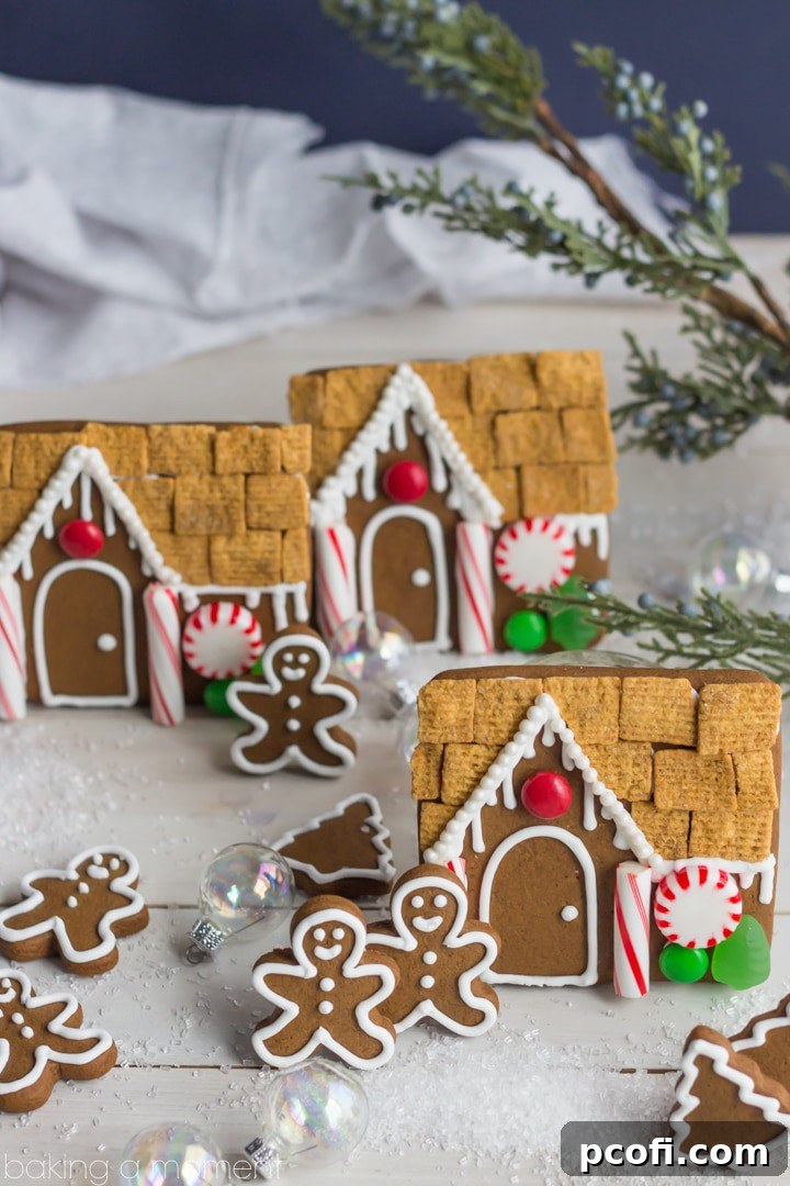 Freshly baked gingerbread cookies cooling on a wire rack, showing their golden-brown edges and perfect shapes.