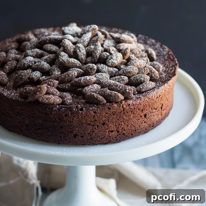 Rich Chocolate Amaretto Torte, a delightful cake-soufflé hybrid with sweet almond notes, perfect for any celebration. #chocolatetorte #amarettocake #dessertrecipe