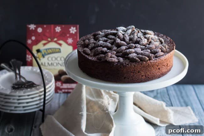 Finished Chocolate Amaretto Torte on a serving platter, ready to be enjoyed. #chocolatetorte #amarettodessert #bakinginspiration