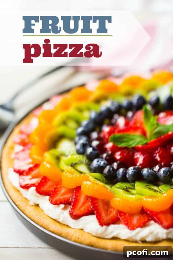Glazed fruit pizza on a white background with a text overlay reading "Fruit Pizza." A visually stunning dessert with a sugar cookie base, cream cheese frosting, and colorful fresh fruit, perfect for any occasion.