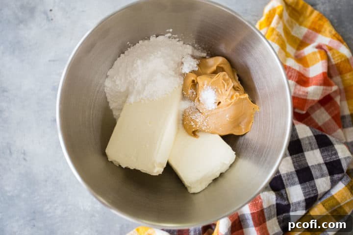 Cream cheese, peanut butter, powdered sugar, and salt in a large mixing bowl.