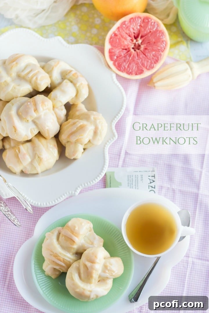 Grapefruit Bowknots - A close-up of the beautifully glazed, soft citrus rolls, ideal for a memorable brunch spread.