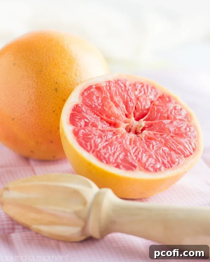Fresh grapefruit, a key ingredient for the zesty flavor in the bowknot rolls, sliced and ready for use.