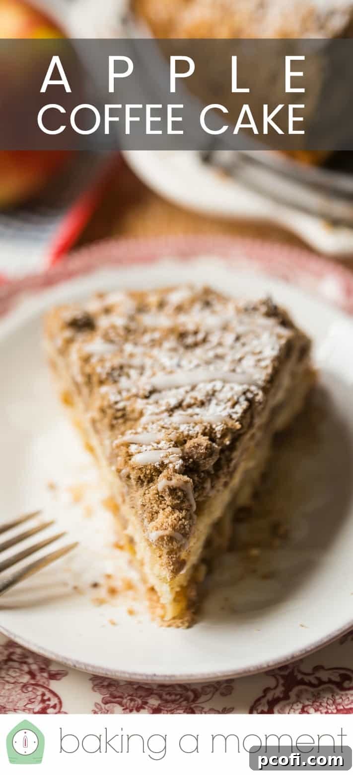 Wedge of homemade apple coffee cake on a vintage red plate with a silver fork and a text overlay above reading "Apple Coffee Cake."