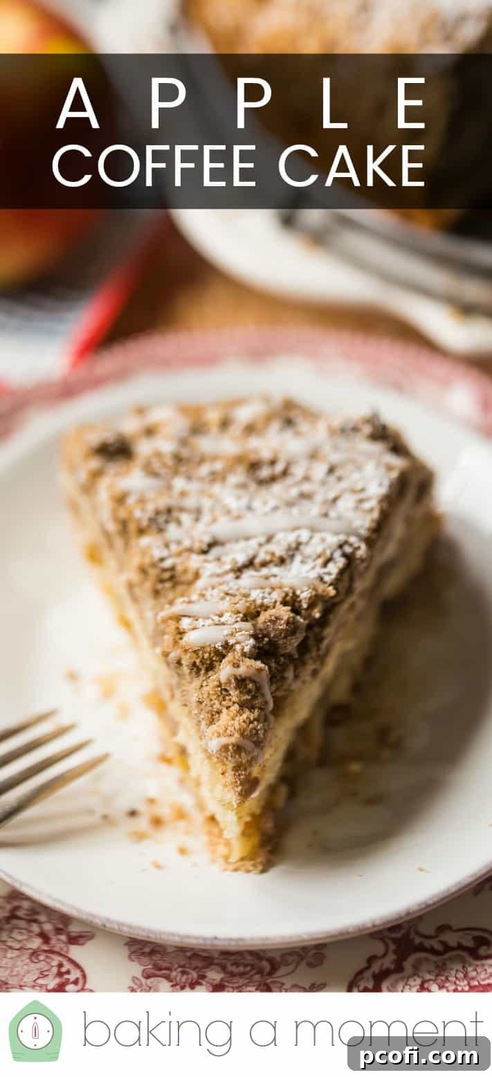 Wedge of homemade apple coffee cake on a vintage red plate with a silver fork and a text overlay above reading "Apple Coffee Cake."