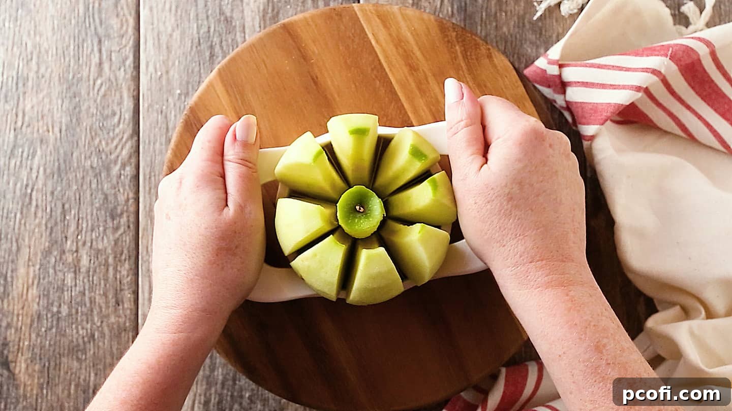 Cutting apples into eighths for apple dumplings, preparing the filling for this delightful dessert.