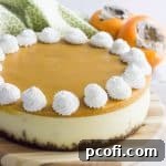 Close-up of a perfectly baked Persimmon Cheesecake slice, showcasing its creamy texture and vibrant topping.