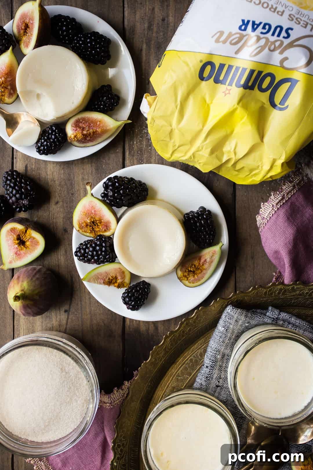 Overhead image of pannacotta, garnished with fresh fruit.