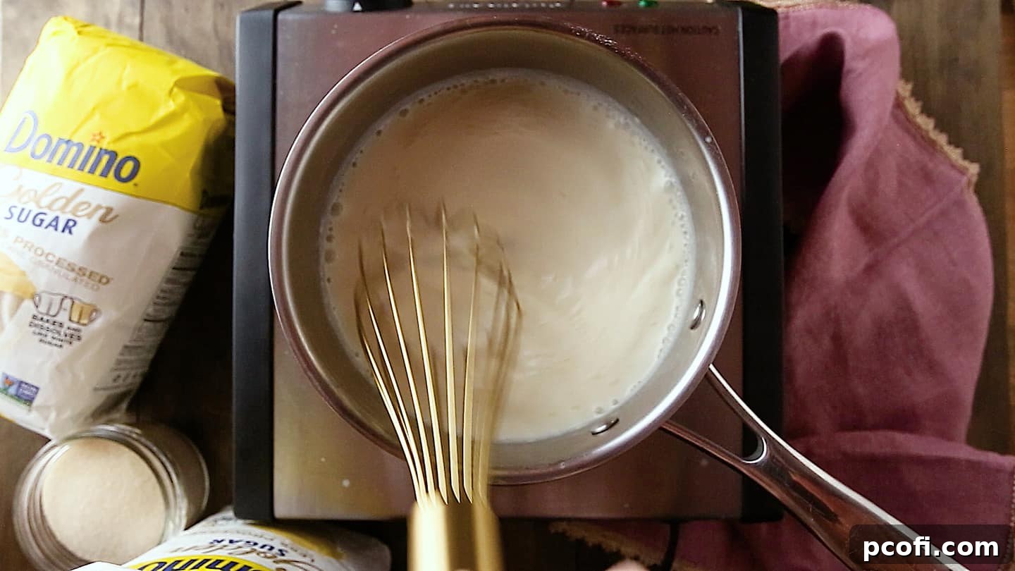 Making panna cotta: Whisking the mixture to eliminate lumps.