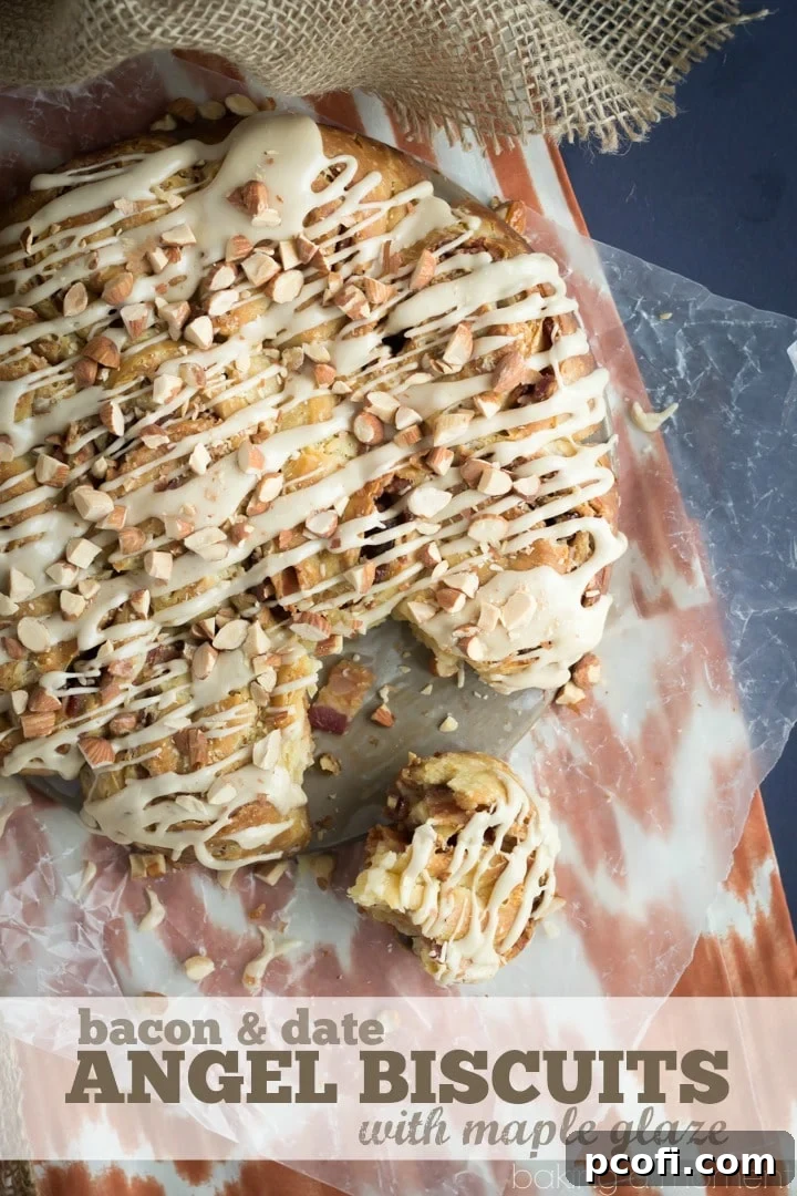 Closeup of freshly baked Angel Biscuits showcasing the bacon and date filling, golden brown crust, and ready for a maple glaze drizzle.