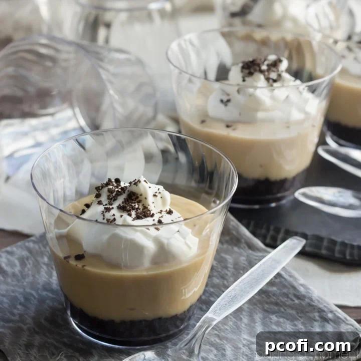 Smooth, creamy salted caramel pudding, a truly decadent and irresistible dessert experience, served in a glass bowl.