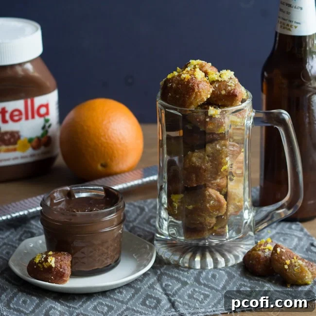 Soft, chewy citrus-infused beer pretzel bites served with a decadent Nutella dip – a truly loved snack with unique flavor.