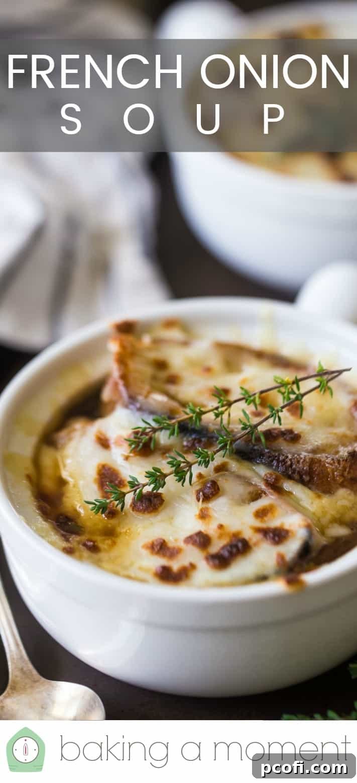 Close up image of a bowl of French onion soup with melted, browned cheese and fresh thyme, with a text overlay above reading "French Onion Soup."